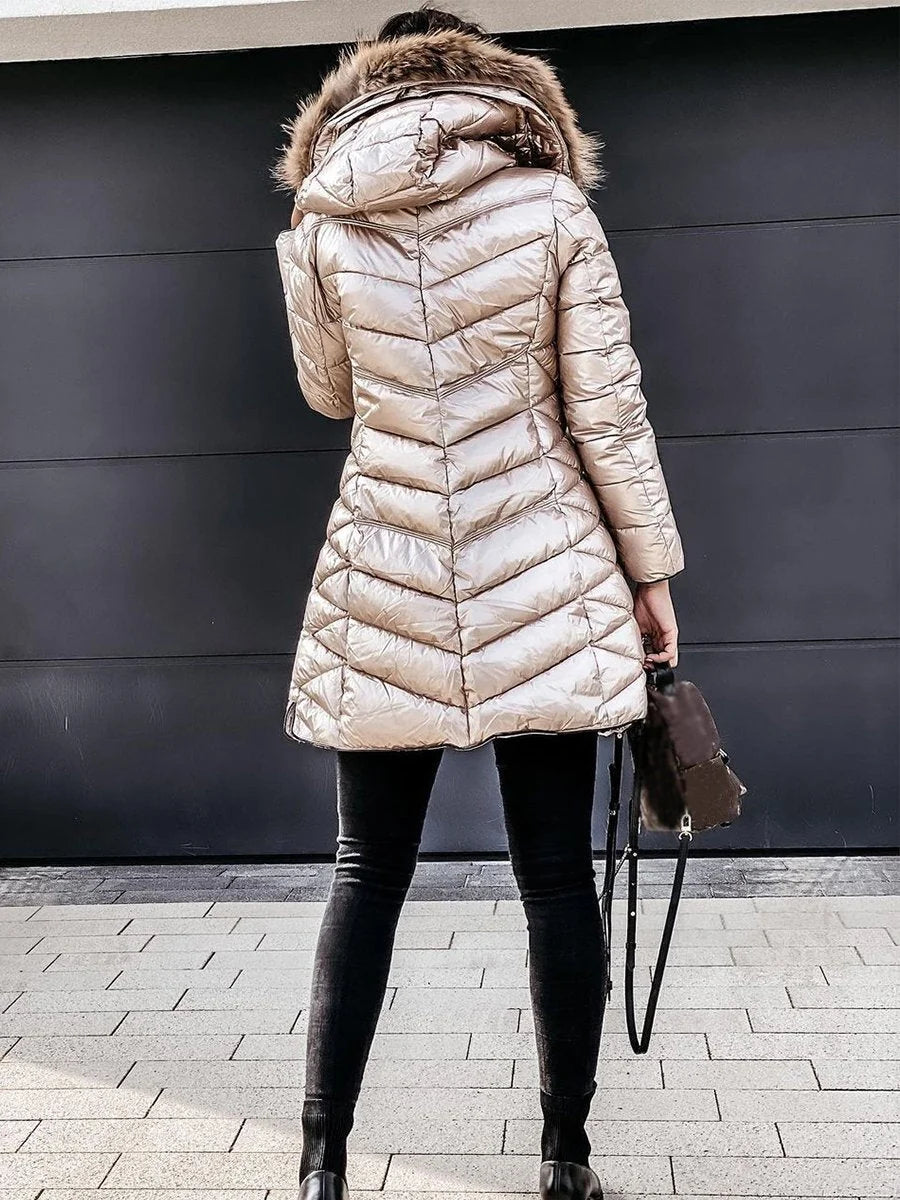 Brunhilde | Quilted jacket with faux fur hood and zip pockets 1