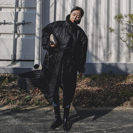 Women's padded longline coat with high stand-up collar and quilted seams 2