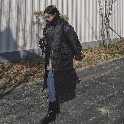 Women's padded longline coat with high stand-up collar and quilted seams 3