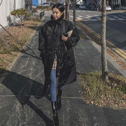 Women's padded longline coat with high stand-up collar and quilted seams 5